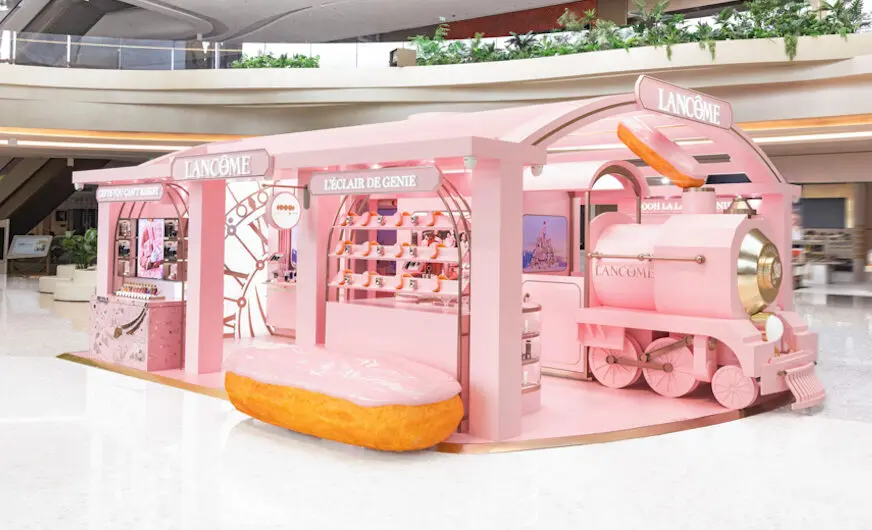 Lancome pink train travel retail activation 