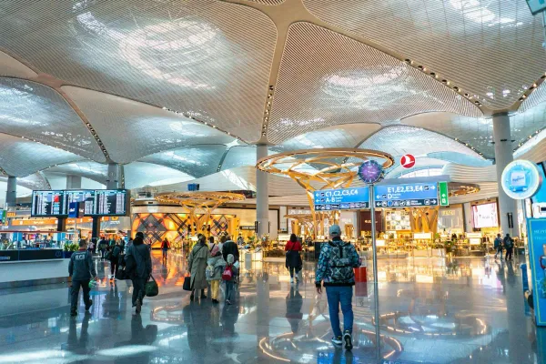 Passengers inside a busy ariport building